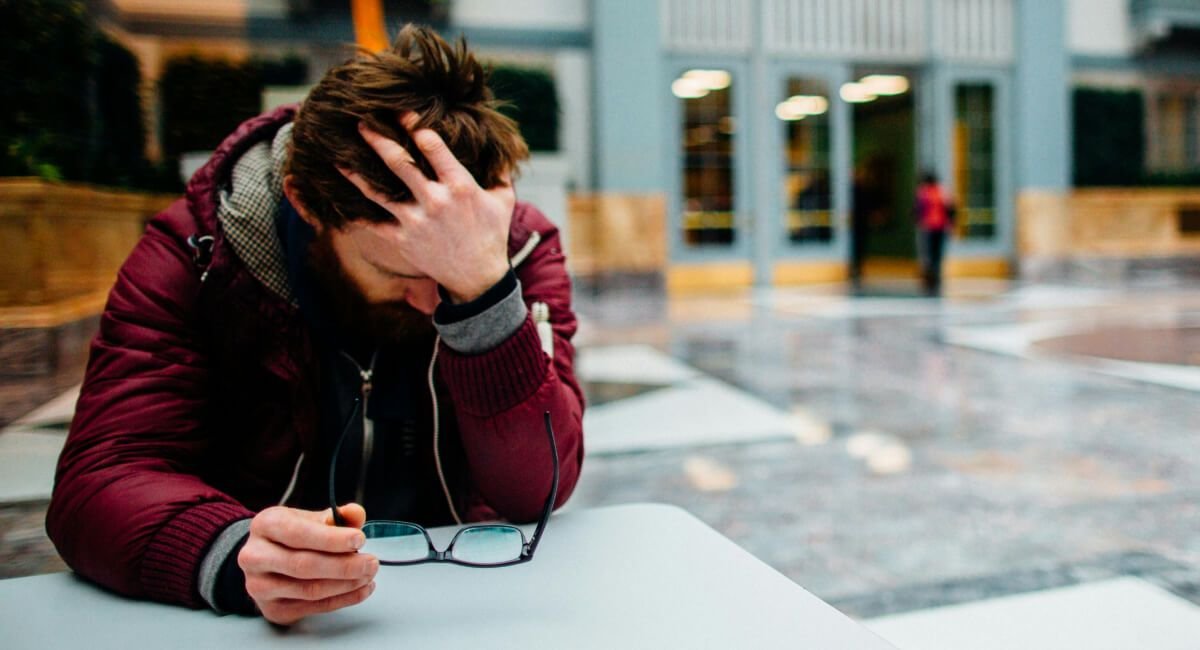 Stressed recruiter experiencing burnout at work