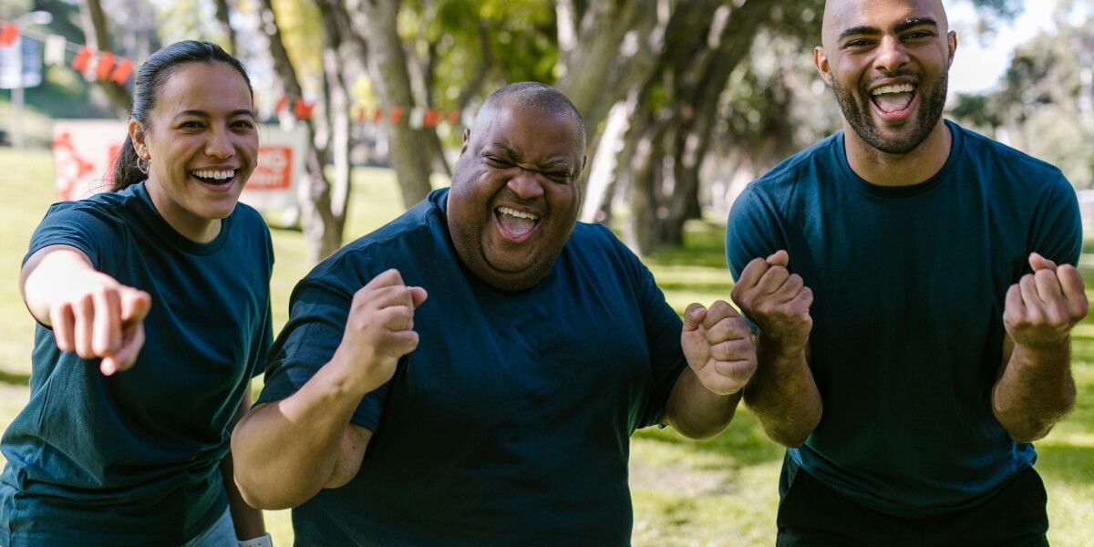 Team celebrating successful hires from employee referral program